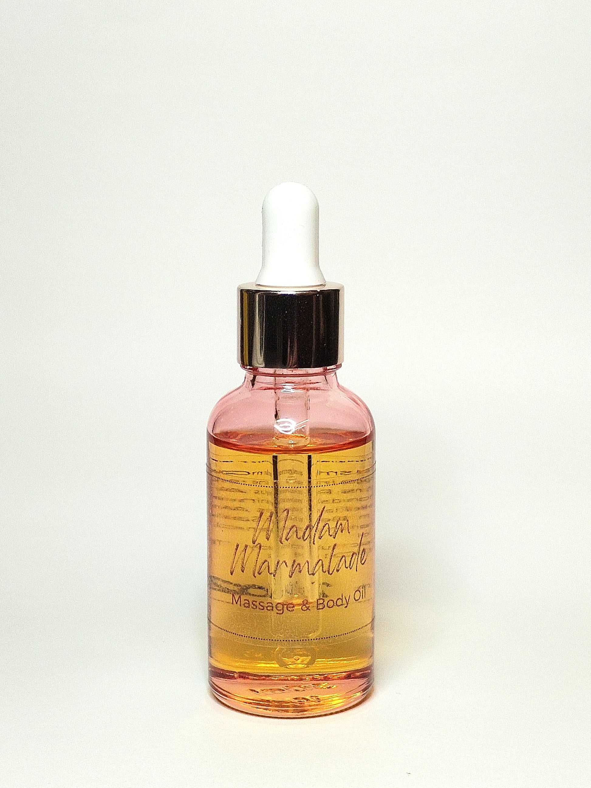 Massage and Body oil 25g bottle scented in Madam Marmalade. Other scents available.